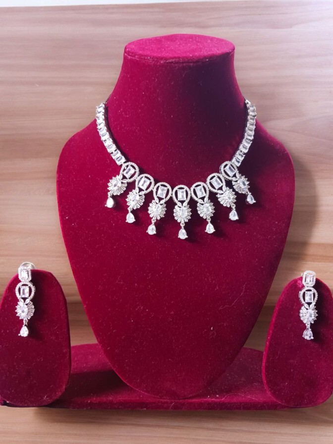 White AD necklace